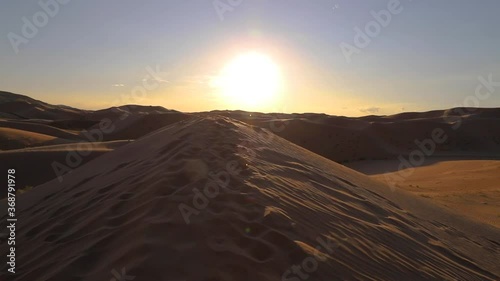 sand storms in desert in windy day in XiangshaWan, or Singing sand Bay, in hobq or kubuqi desert, Inner Mongolia, China