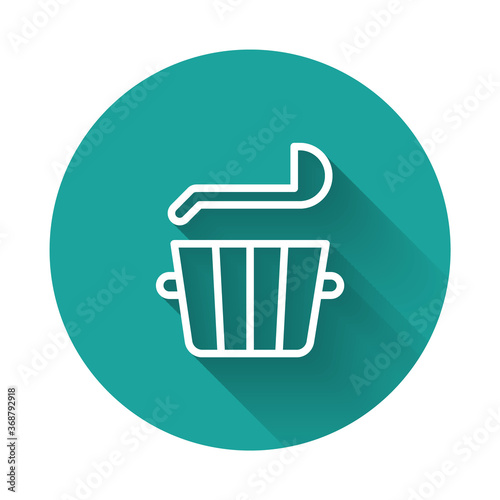 White line Sauna bucket and ladle icon isolated with long shadow. Green circle button. Vector.