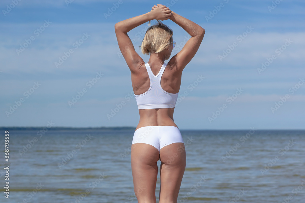 Fototapeta premium young woman in white lingerie