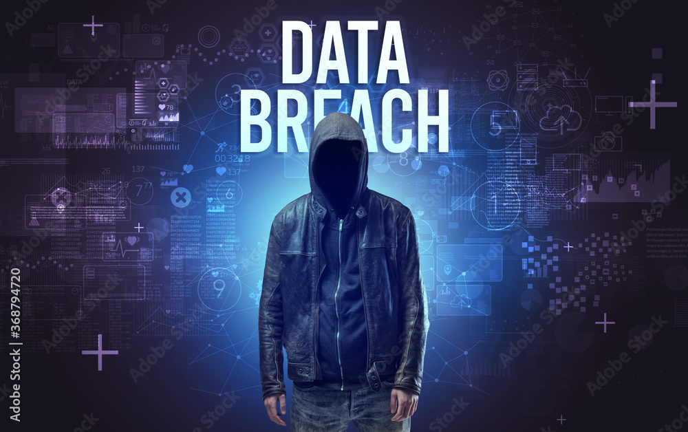 Faceless man with DATA BREACH inscription, online security concept Faceless man with DATA BREACH inscription, online security concept