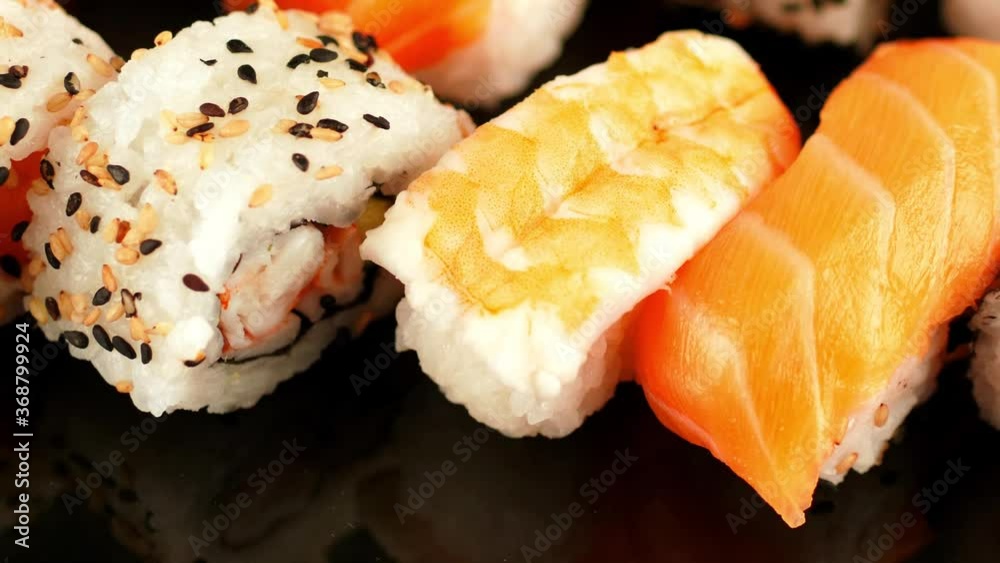 japanese sushi food. Maki ands rolls with tuna, salmon, shrimp, crab and avocado. assorted sushi. japanese sushi food. Maki ands rolls with tuna, salmon, shrimp, crab and avocado. assorted sushi.