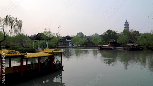 tourists enjoying boat trips in Yangzhou Slender West Lake, Jiangsu Province, China