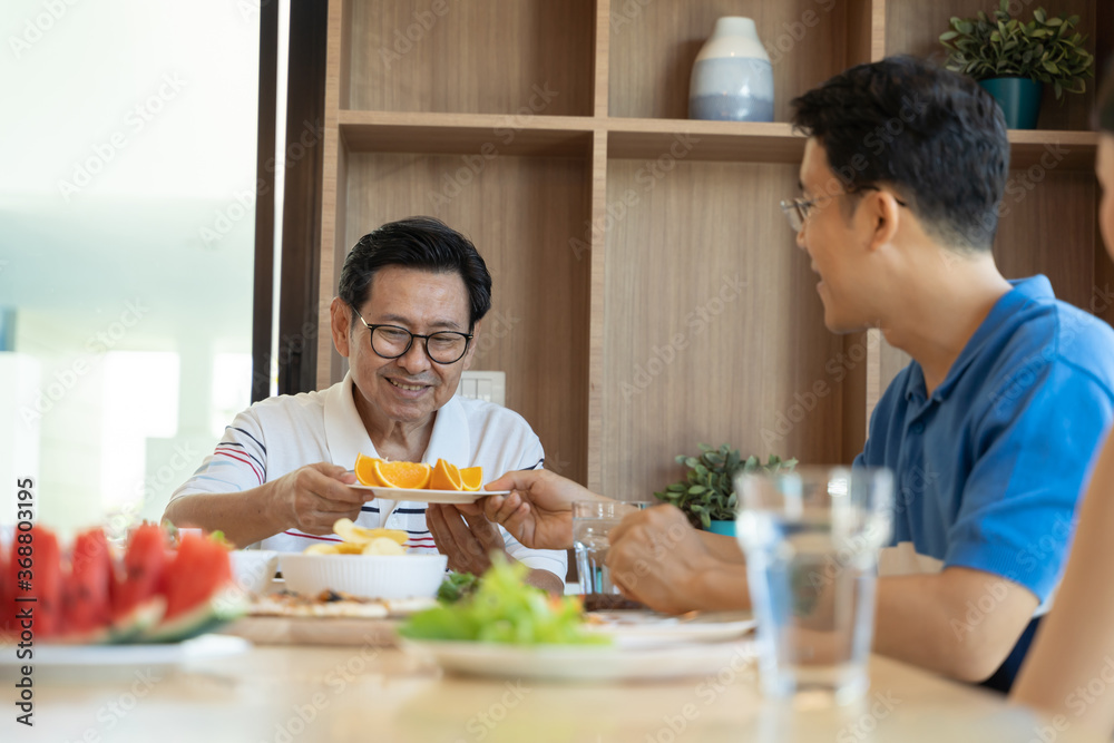 asian family having a happy meal. Happy lifestyle family moments. asian family having a happy meal. Happy lifestyle family moments.