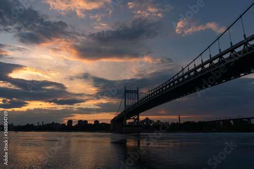 Triborough Bridge during a Beautiful Sunset over the East River connecting Astoria Queens New York to Wards and Randall's Island © James