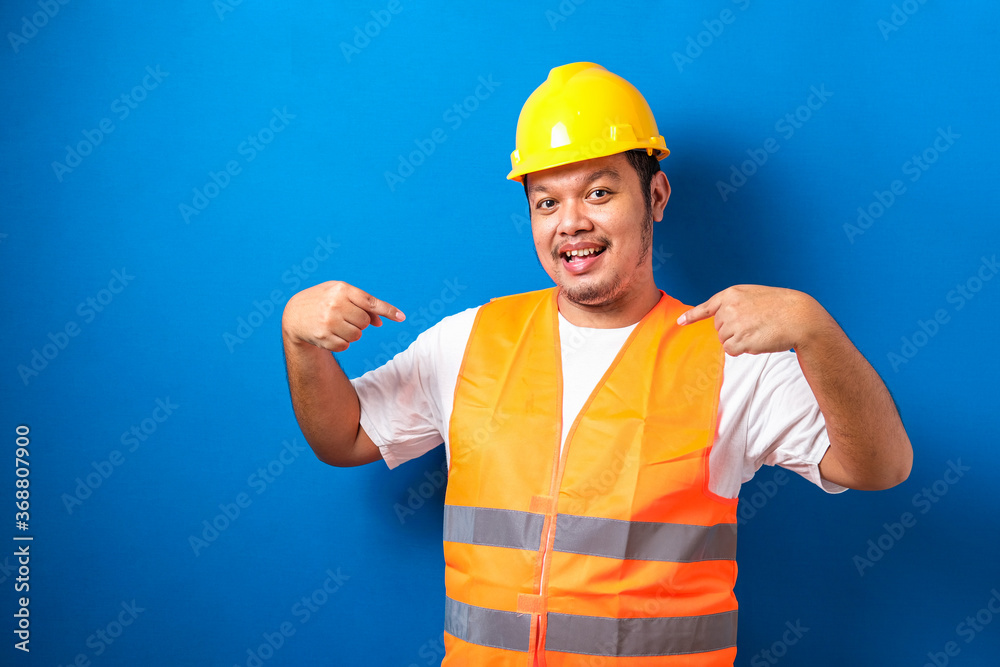 Asian worker man smile on face pointing oneself Asian worker man smile on face pointing oneself