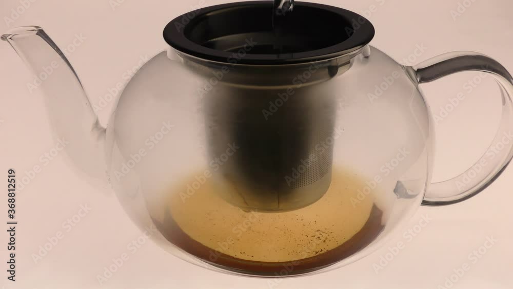 Healthy fruit Tea in a glass teapot. Healthy fruit Tea in a glass teapot.