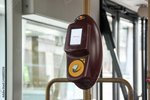 An oyster card tapping machine on London Bus