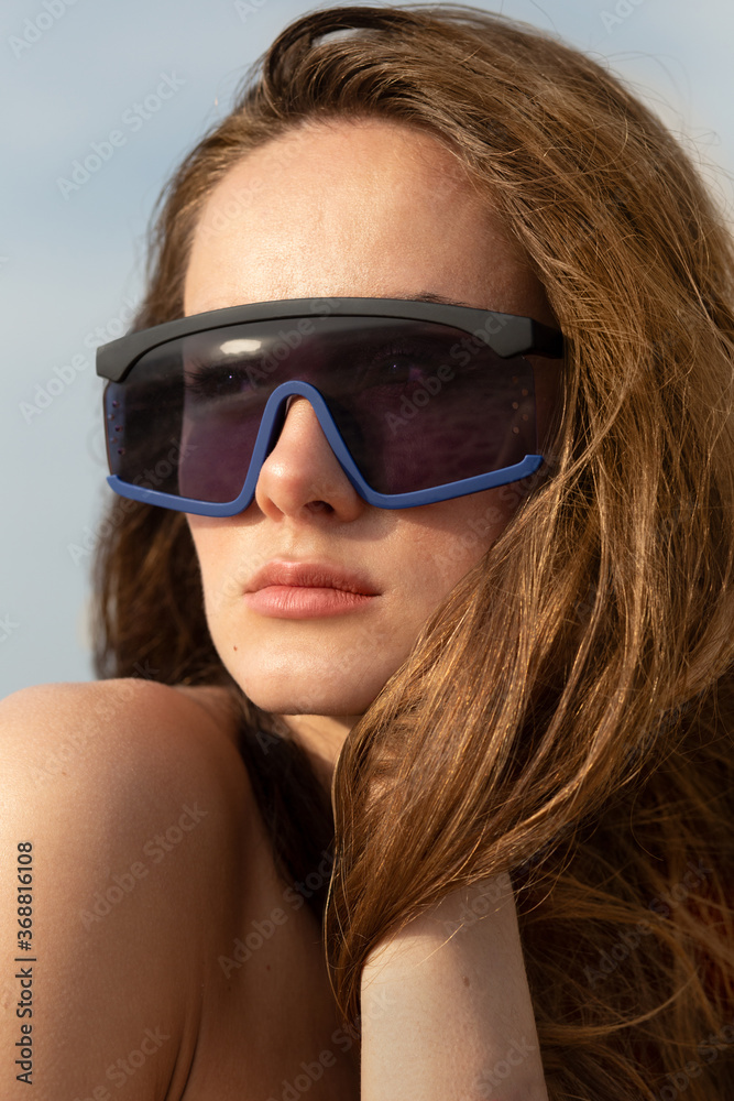 woman sunglass fashion accessories on beach modern model