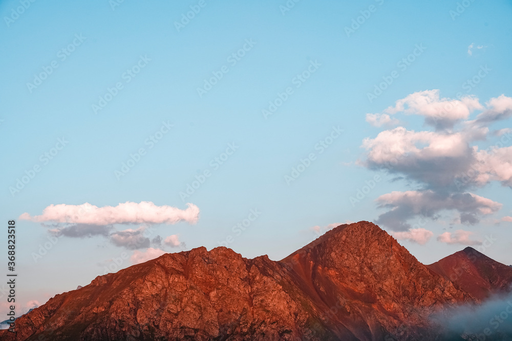 Red Mountains cliffs of the North Caucasus at sunset. Beautiful landscape