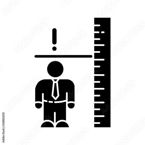 Dwarfism black glyph icon. Chronic genetic condition. Person with short height. Measurement of businessman. Worker with disorder. Silhouette symbol on white space. Vector isolated illustration
