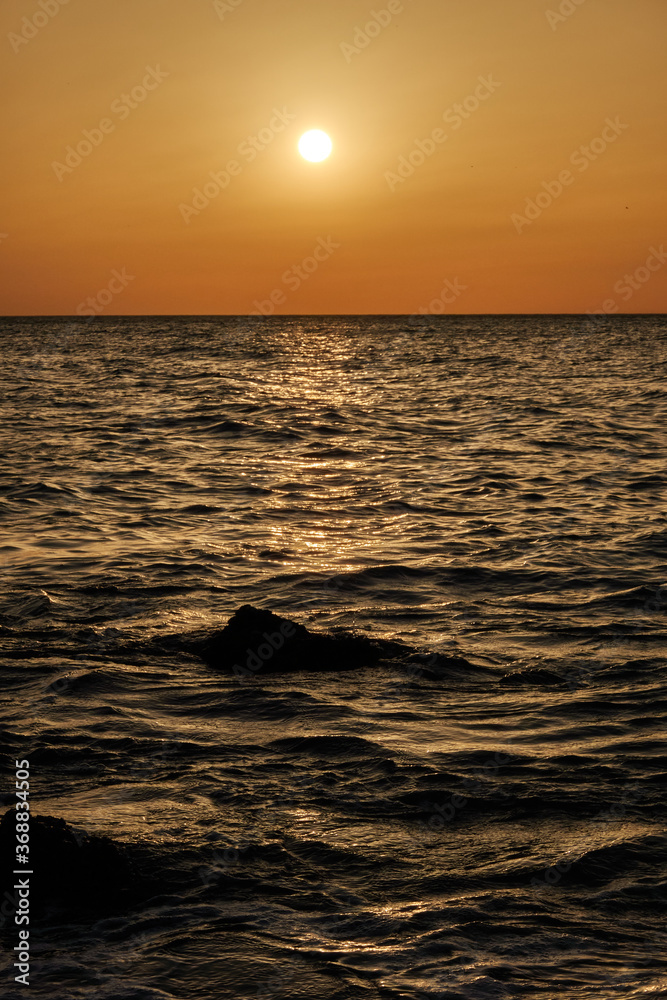 Sunset at Cala El Frailecillo in the Calas de Roche de Conil de la Frontera. Cadiz Andalusia. Spain Sunset at Cala El Frailecillo in the Calas de Roche de Conil de la Frontera. Cadiz Andalusia. Spain