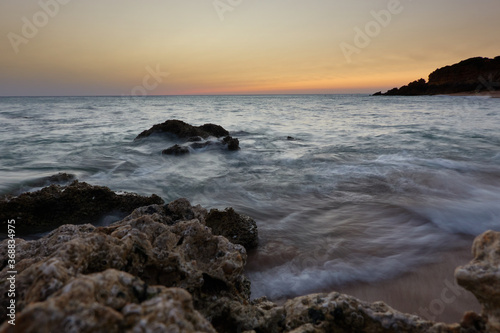 The golden hour during sunset at Cala El Frailecillo in the Calas de Roche de Conil de la Frontera. Cadiz Andalusia. Spain