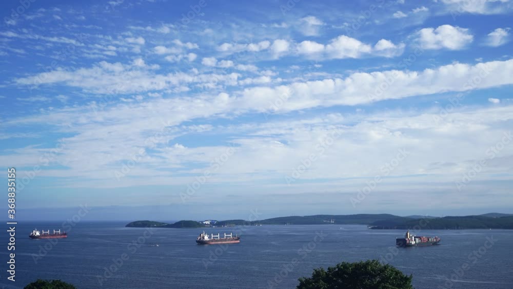 Seascape with a view of cargo ships. Vladivostok, Russia Seascape with a view of cargo ships. Vladivostok, Russia