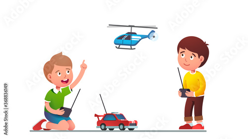Boys kids playing with radio-controlled toy car