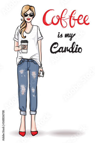 .Positive greeting card. Young attractive woman in a modern everyday unformal casual wear white t-shirt and boyfriend jeans. Coffee is my cardio hand lettering. Blondie model holding a cup of coffee.