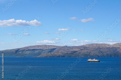 A ferry boat passing the Isle of Mull in Scotland.
