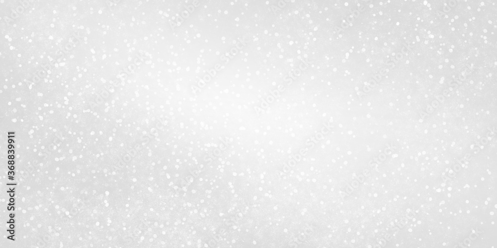 white shiny winter light background with snow and snowfall