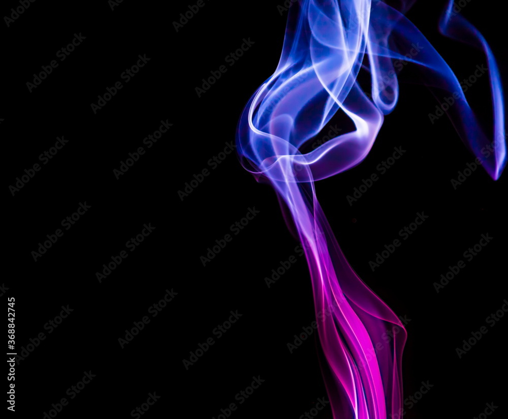 Colored smoke on black background Colored smoke on black background