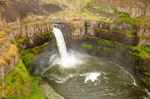 Palouse falls pours into a huge rock basin in eastern Washington