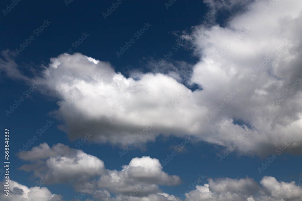 Blue sky background with a white clouds. Blue sky background with a white clouds.