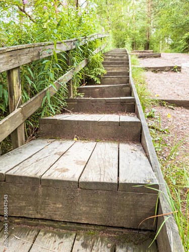 Foot bridge in the middle of forest next to Delsjön lake in gothenburg Sweden