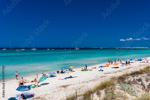 ES TRENC, Majorca, Spain - 25 JULY 2020 - People enjoying summer day on hotspot beach in Majorka. © Martin Valigursky