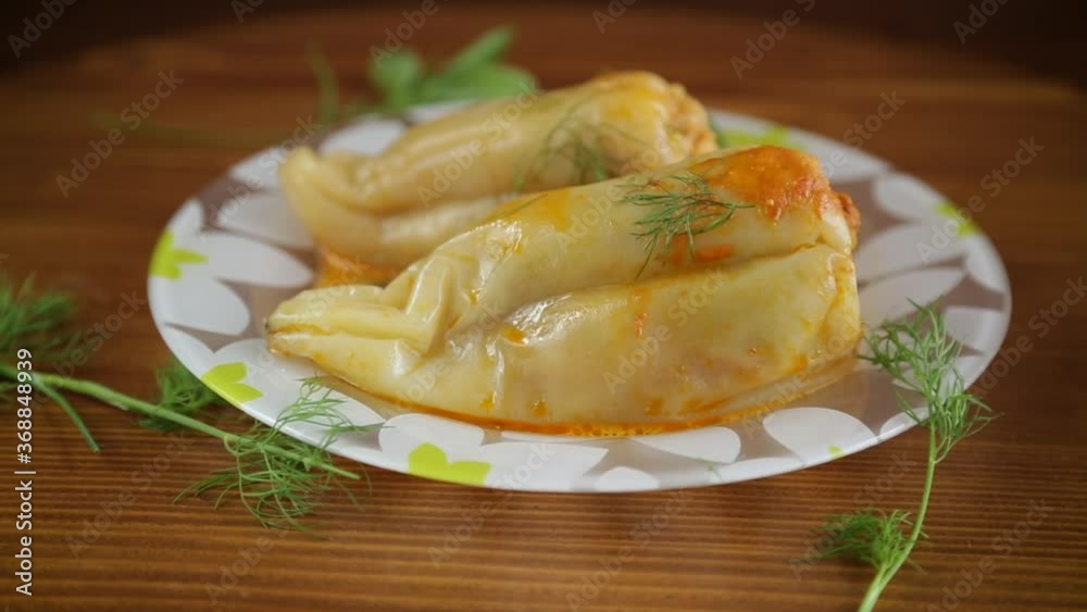stuffed with meat and rice with roasted pepper sauce stuffed with meat and rice with roasted pepper sauce