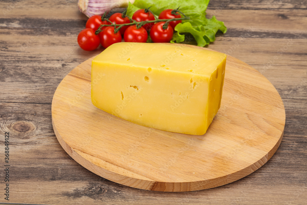 Hard yellow tasty cheese brick Hard yellow tasty cheese brick