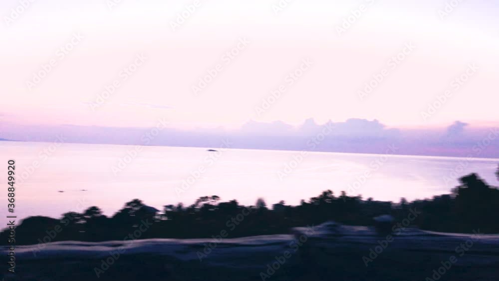 Scenic Sunset View At The Koh Phangan Island In Thailand - panning shot Scenic Sunset View At The Koh Phangan Island In Thailand - panning shot