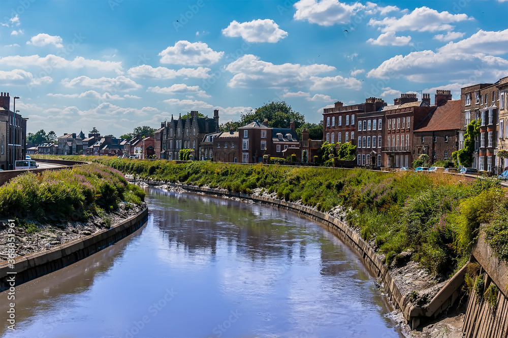 A view southward down the River Nene in Wisbech, Cambridgeshire in the summertime