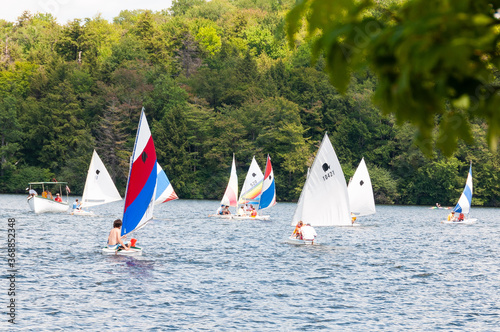 sailboats on a lake