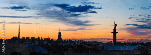 Saint Petersburg, Russia. Roofs of the ancient city at sunset, Alexander Column, Hermitage, colorful sky, panoramic view