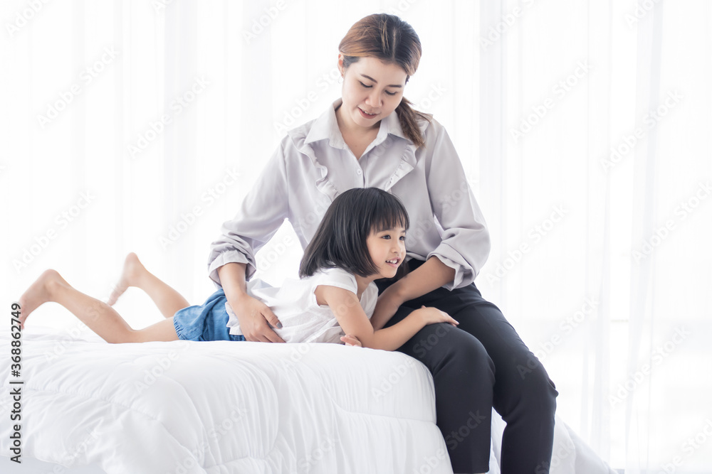 Mom and daughter spending happy time in holiday Mom and daughter spending happy time in holiday