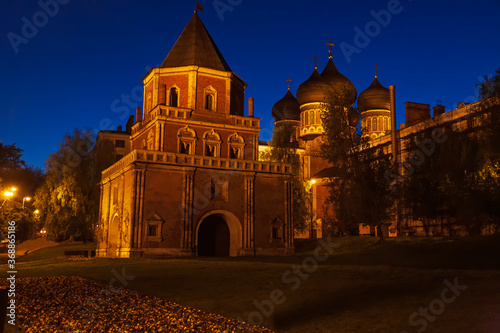 The Bridge Tower and the Intercession Cathedral with building light at night in the Izmaylovo Manor in Moscow, Russia