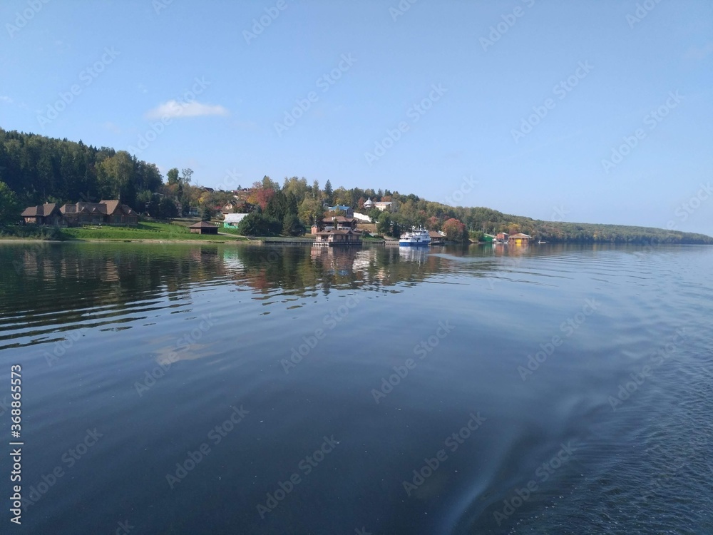 Obraz premium A village on the river Bank.