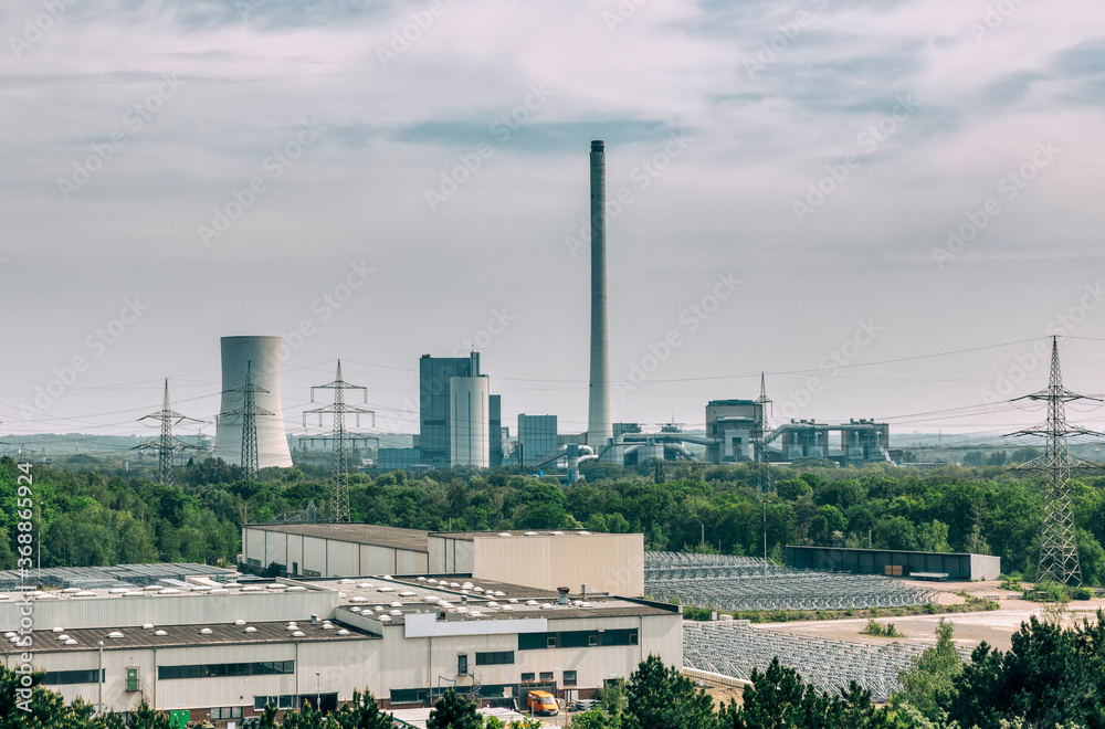 Fototapeta premium View over industrial district to cogeneration plant in Herne, NRW, Germany