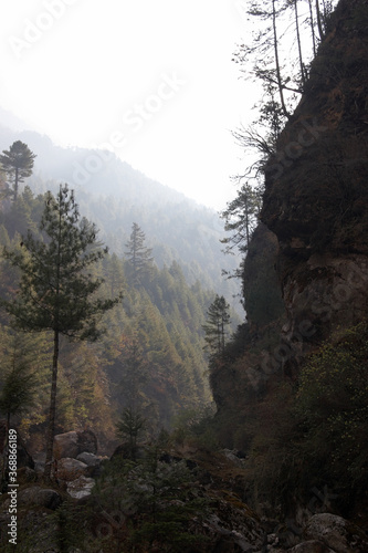Deep ravine with morning mist, Everest trail, Himalayas, Nepal
