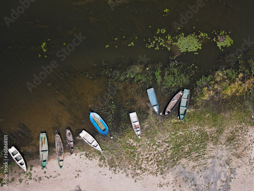 Fishing boats in a small village in Dobrogea, Romania. Aerial view. photo