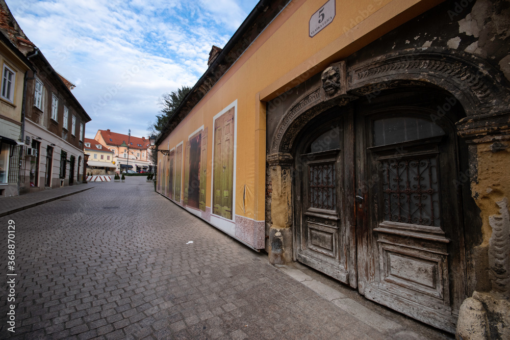 Zagreb / Croatia - December 31 / 2020 : building with old doors at zagreb streets