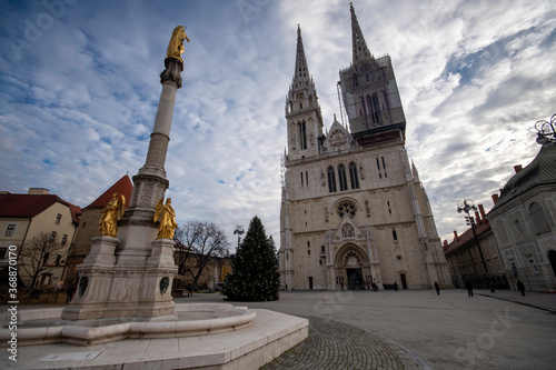 Zagreb / Croatia - December 31 / 2020: Golden angel statues at the square of ZAgreb cathedral