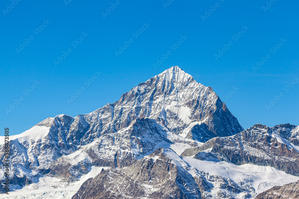 Stunning close up view of Weisshorn peak near Matterhorn in Zermatt
