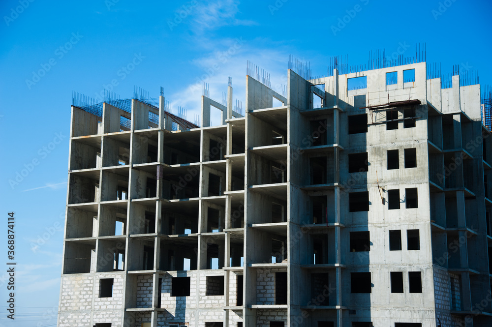 Fototapeta premium Construction of multi-storey residential building