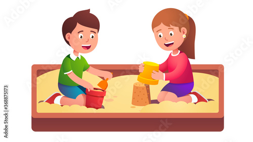 Two happy kids friends playing together in sandbox
