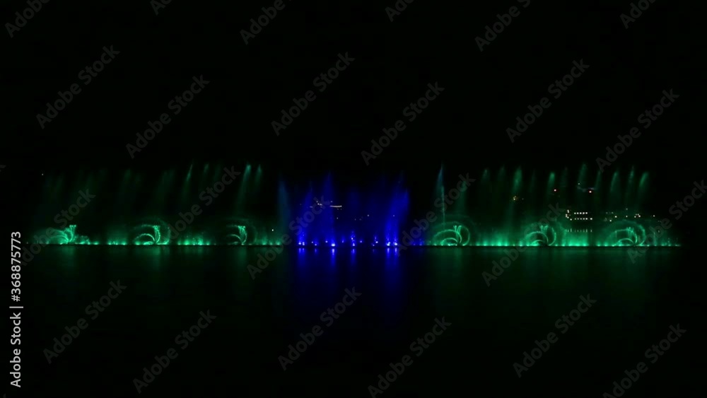 A show of fountains against the background of the night sky from the water multi-colored jets and combinations. A show of fountains against the background of the night sky from the water multi-colored jets and combinations.