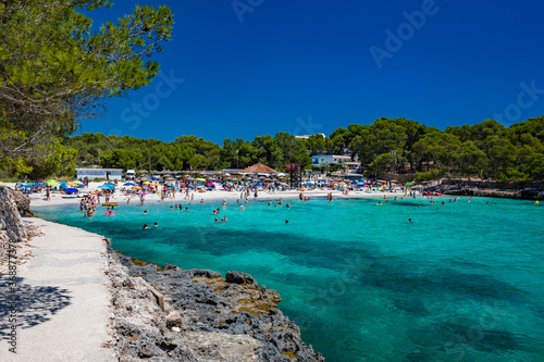 CALA MONDRAGO  Majorka  Spain  24 July 2020 - People enjoy the beach in summer  Parque Natural de Mondrago. Santanyi. Malorca. Spain