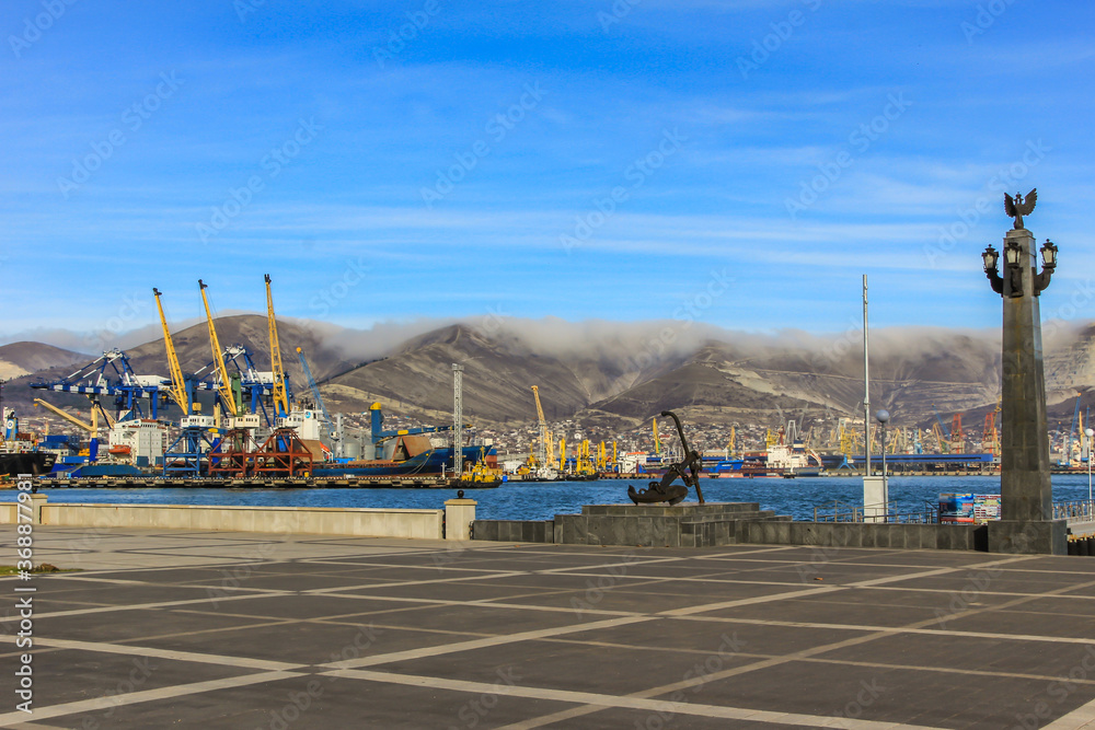 Fototapeta premium 09.12.2012, Novorossiysk, Russia. Cityscape of historical Russian town at sunny day.