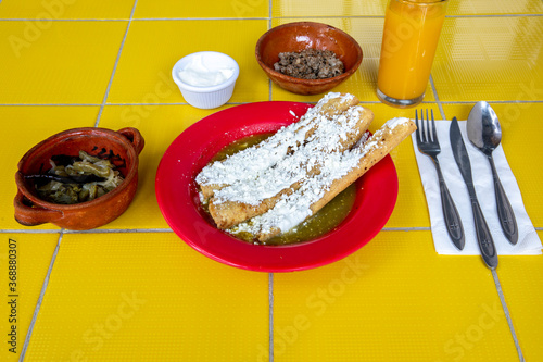 Homemade flutes or golden tacos. photo