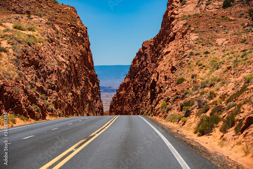 Empty scenic highway in Arizona, USA. Landscape with rocks, Road against the high rocky. mountains