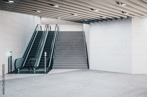 Modern train station interior with escalator photo
