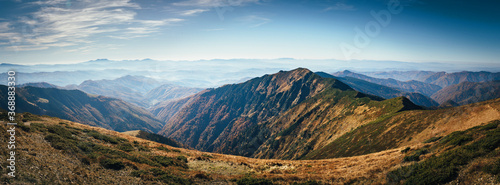 Autumn Carpathian mountains scenic landscape panorama.